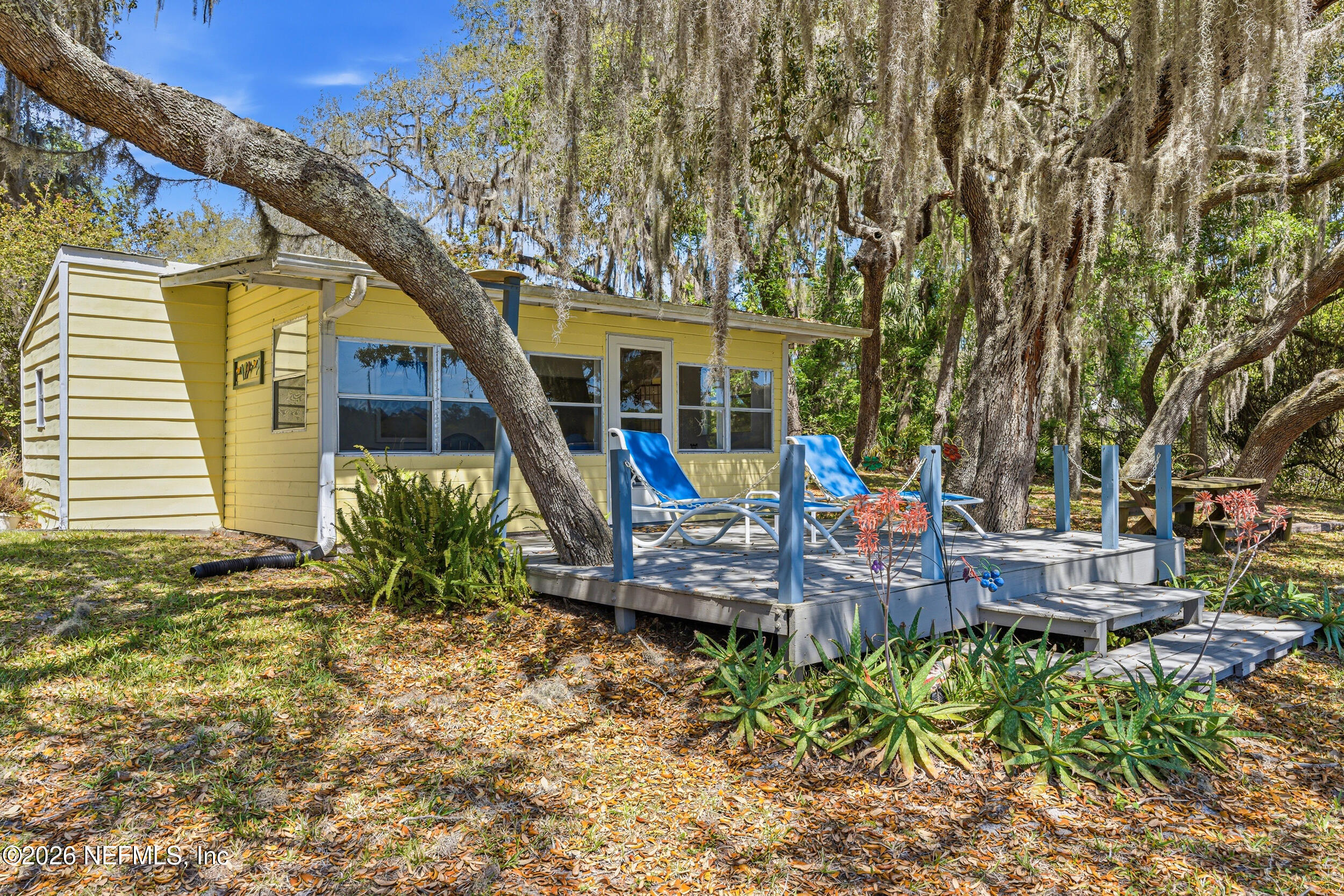 115 Lake Susan Road Hawthorne, FL 32640 - Photo 45 of 62 a view of a house with backyard and sitting area