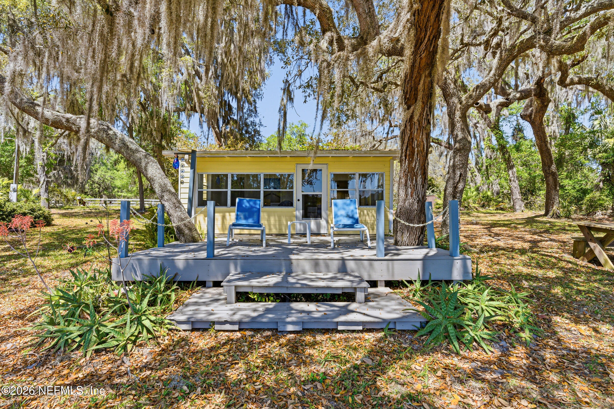 115 Lake Susan Road Hawthorne, FL 32640 - Photo 46 of 62 a view of a house with garden and sitting area