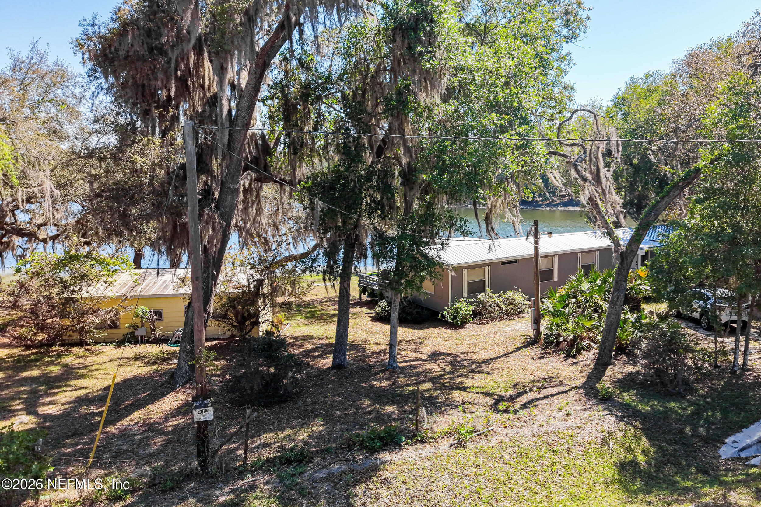 115 Lake Susan Road Hawthorne, FL 32640 - Photo 47 of 62 a view of a yard with a tree