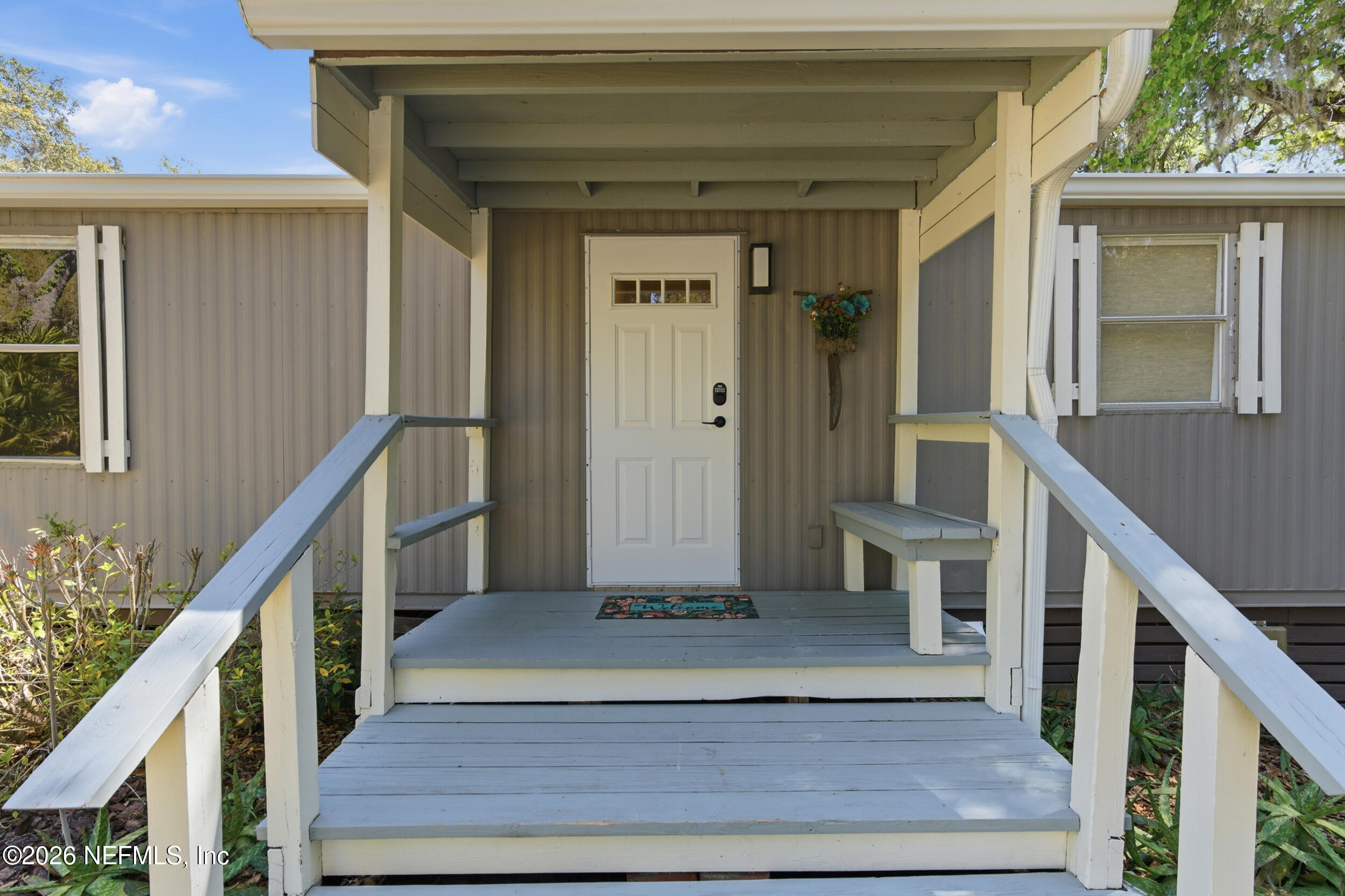 115 Lake Susan Road Hawthorne, FL 32640 - Photo 6 of 62 a view of entryway with wooden floor and stairs