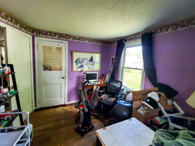 a room with furniture and a window