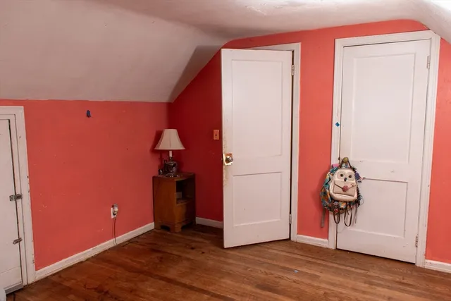 a view of a storage & utility room with wooden floor