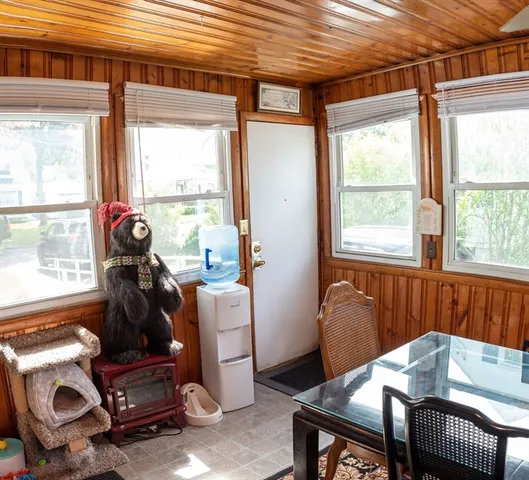 a room with furniture and a window