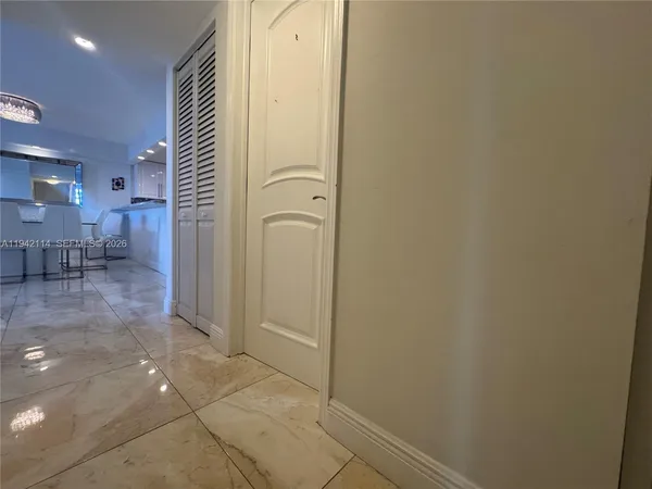 a bathroom with a shower and a toilet