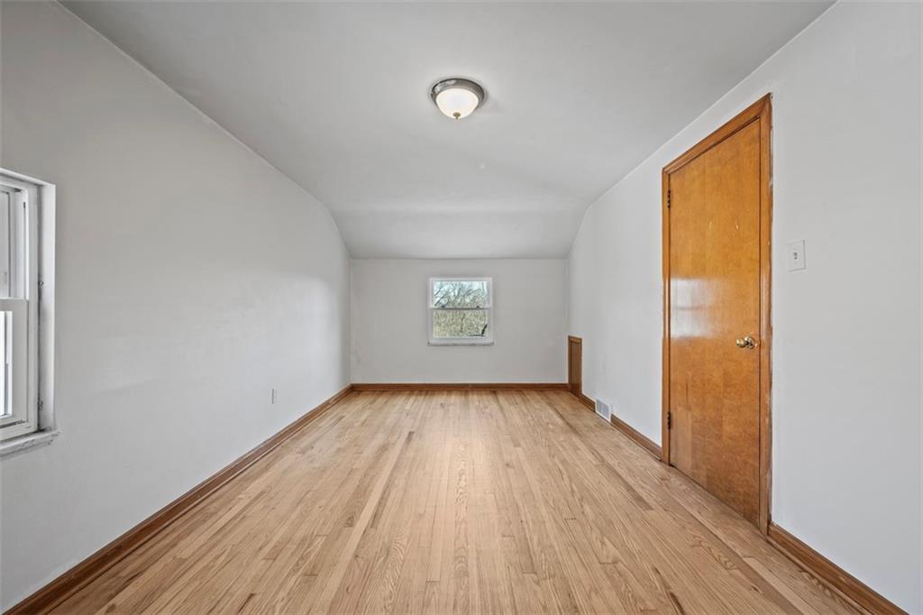 259 Bascom Avenue Pittsburgh, PA 15214 - Photo 20 of 35 an empty room with wooden floor and windows