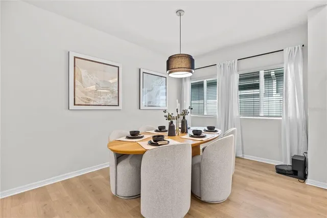 a kitchen with stainless steel appliances a stove top oven and cabinets