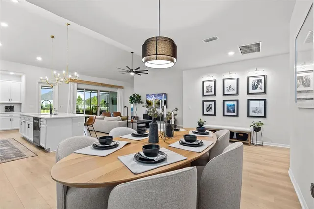 a bedroom with a bed and a book shelf