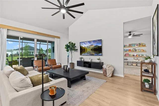 a bedroom with a large bed and a large window