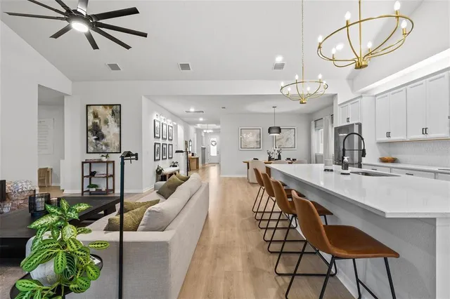 a view of a hallway view with wooden floor and staircase