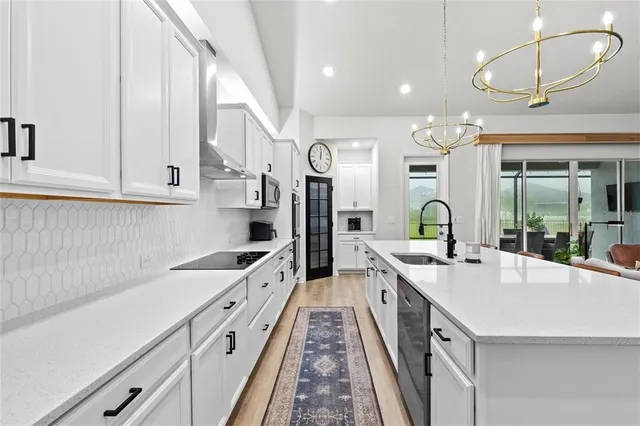 a bedroom with a bed and cabinets