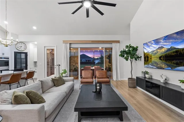 a front view of a house with a garden and plants