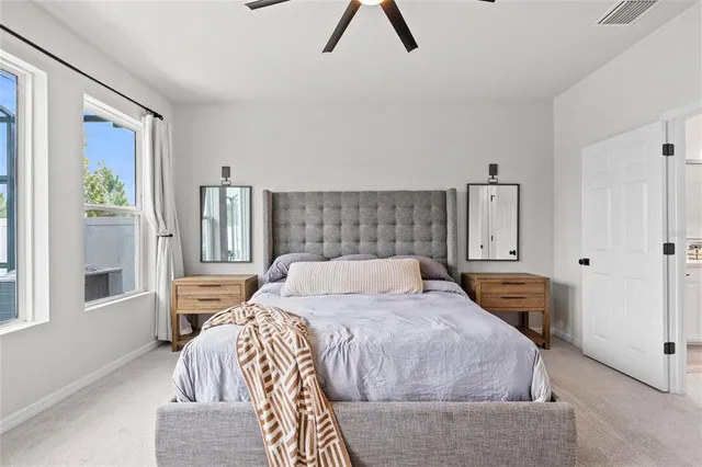 a view of a house with backyard porch and sitting area