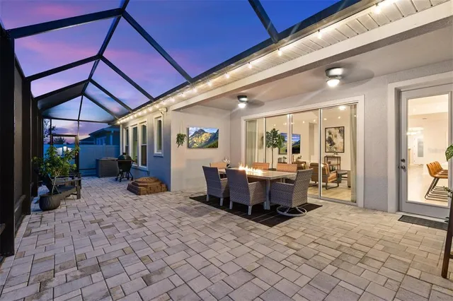 a room with a refrigerator and furniture