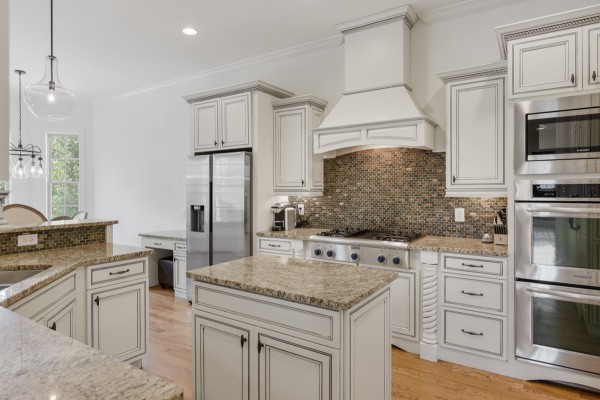 2228 B Highway 25 Cottontown, TN 37048 - Photo 27 of 61 a kitchen with stainless steel appliances granite countertop a stove sink and cabinets