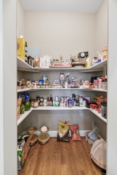 2228 B Highway 25 Cottontown, TN 37048 - Photo 32 of 61 a room with a book shelf and wooden shelves