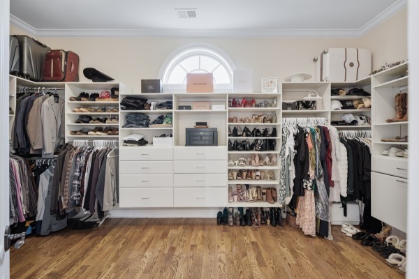 2228 B Highway 25 Cottontown, TN 37048 - Photo 38 of 61 a view of walk in closet with clothes and shoes