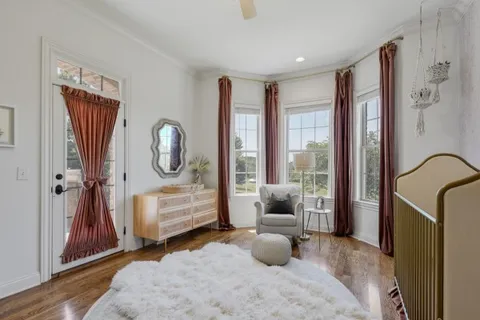 a kitchen with stainless steel appliances granite countertop white cabinets and a sink