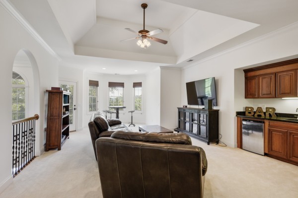 2228 B Highway 25 Cottontown, TN 37048 - Photo 48 of 61 a living room with furniture a flat screen tv and a refrigerator