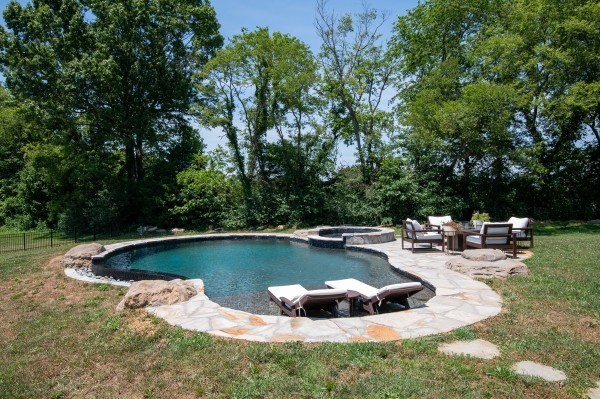 2228 B Highway 25 Cottontown, TN 37048 - Photo 54 of 61 a view of a swimming pool with a yard