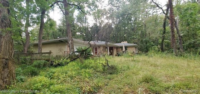 4517 Patterson Lk Road Pinckney, MI 48169 - Photo 2 of 4 Left side.jpg