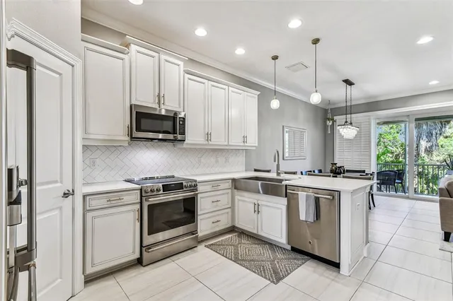 a bathroom with a sink double vanity and shower