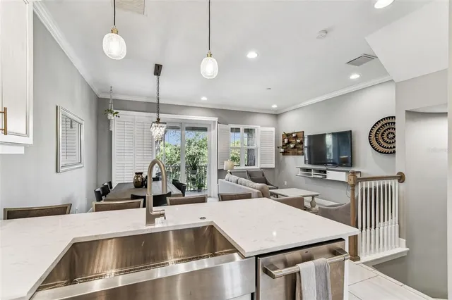 a bathroom with a sink vanity granite tub shower and mirror