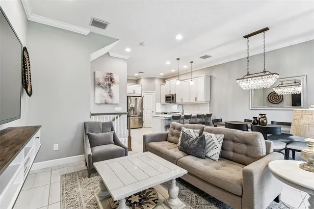 a kitchen with granite countertop a stainless steel appliances and cabinets