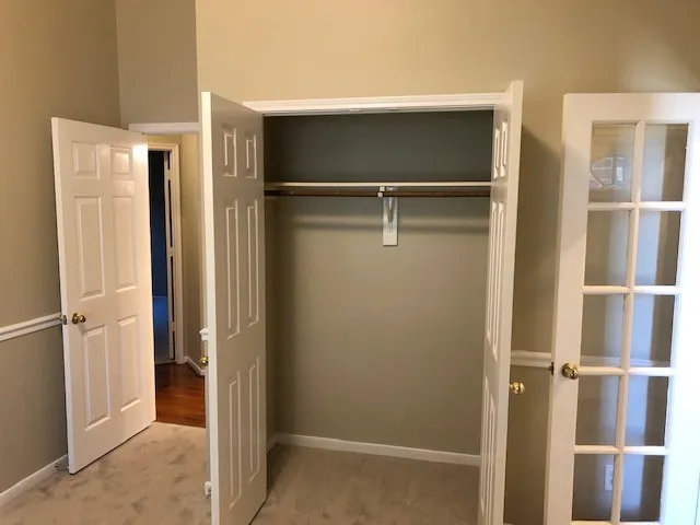 a bathroom with a tub and sink