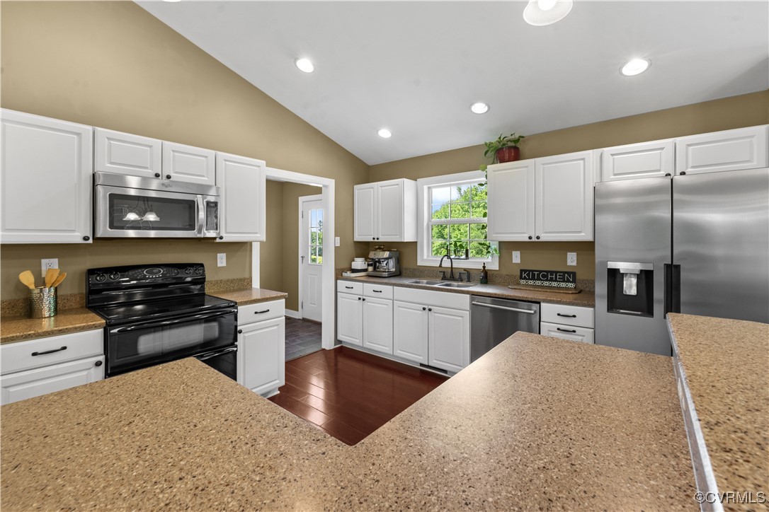 201 School Road Dillwyn, VA 23936 - Photo 20 of 48 a kitchen with stainless steel appliances granite countertop a refrigerator stove microwave and sink