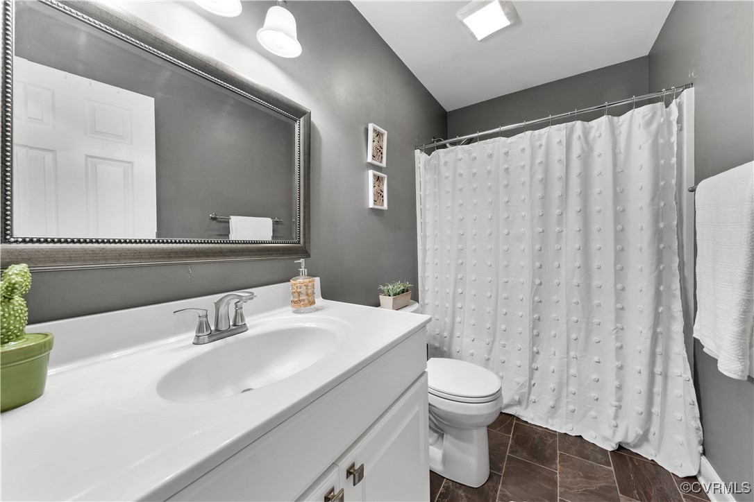 201 School Road Dillwyn, VA 23936 - Photo 29 of 48 a bathroom with a sink toilet and shower