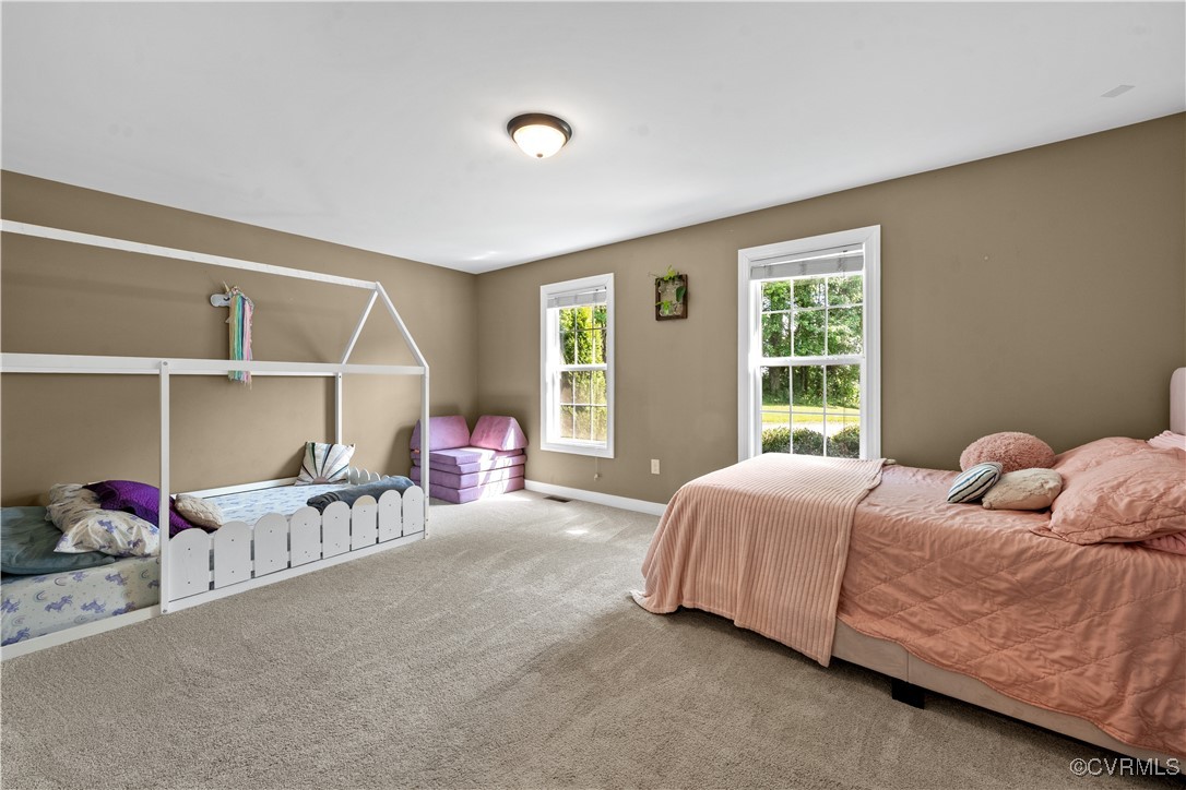 201 School Road Dillwyn, VA 23936 - Photo 30 of 48 a bedroom with furniture and a large window