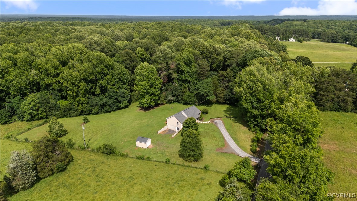 201 School Road Dillwyn, VA 23936 - Photo 3 of 48 a view of a yard with a swimming pool