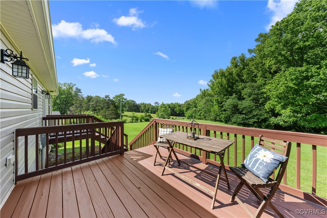 201 School Road Dillwyn, VA 23936 - Photo 39 of 48 a view of a chairs on wooden deck
