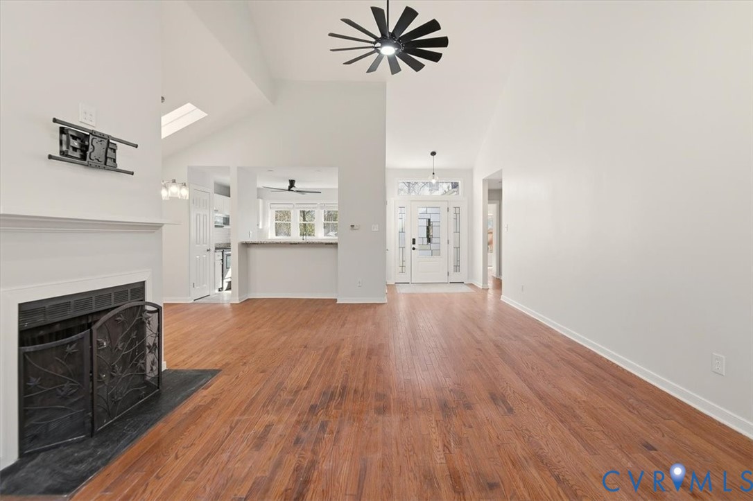 5600 Woods Walk Road Midlothian, VA 23112 - Photo 11 of 44 a view of a kitchen with a sink and a stove top oven