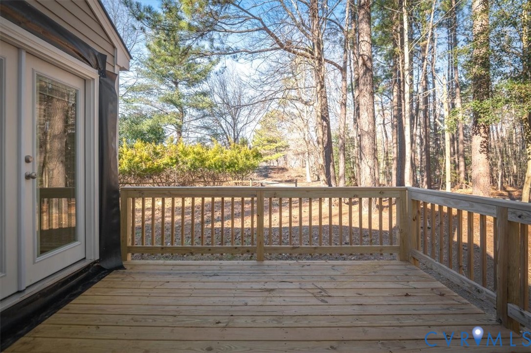 5600 Woods Walk Road Midlothian, VA 23112 - Photo 40 of 44 a view of wooden balcony with wooden floor and fence
