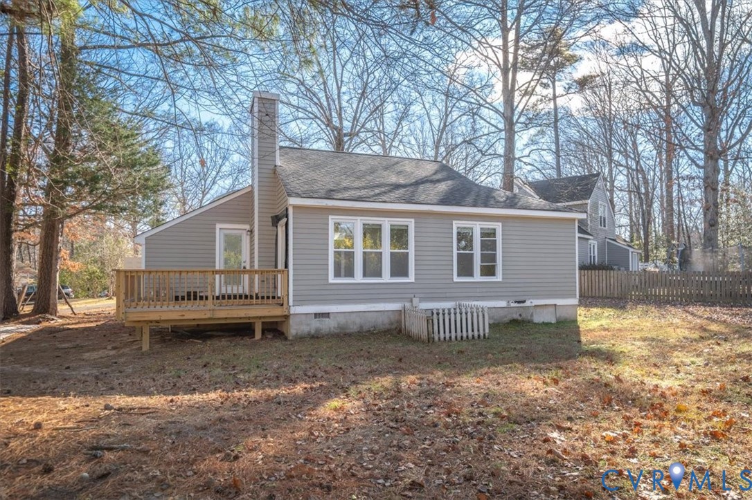 5600 Woods Walk Road Midlothian, VA 23112 - Photo 43 of 44 a front view of a house with a yard