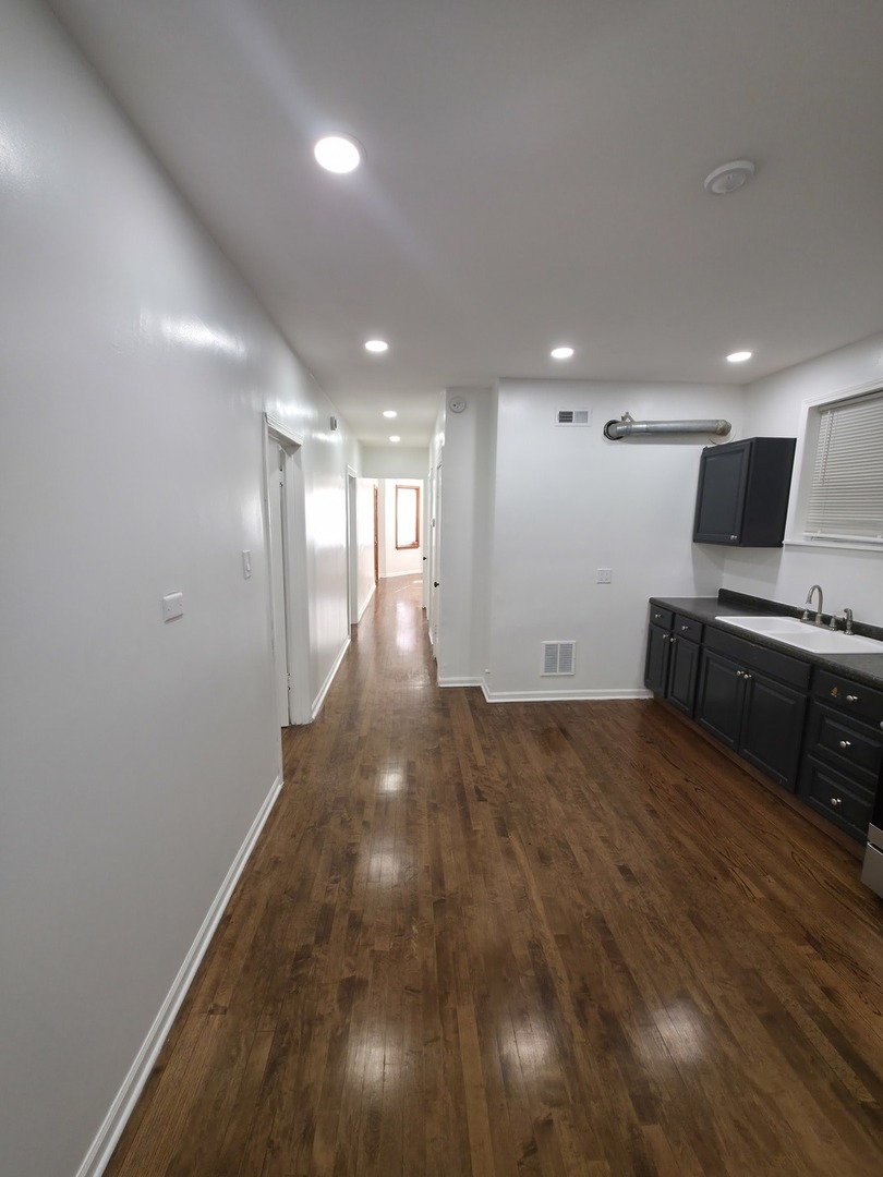 1748 North Keystone Avenue Chicago, IL 60639 - Photo 14 of 33 a view of a kitchen with a sink