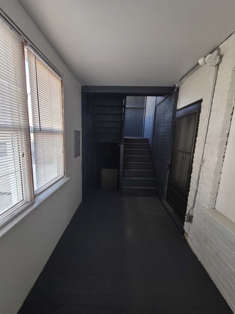 1748 North Keystone Avenue Chicago, IL 60639 - Photo 21 of 33 a view of empty room with windows