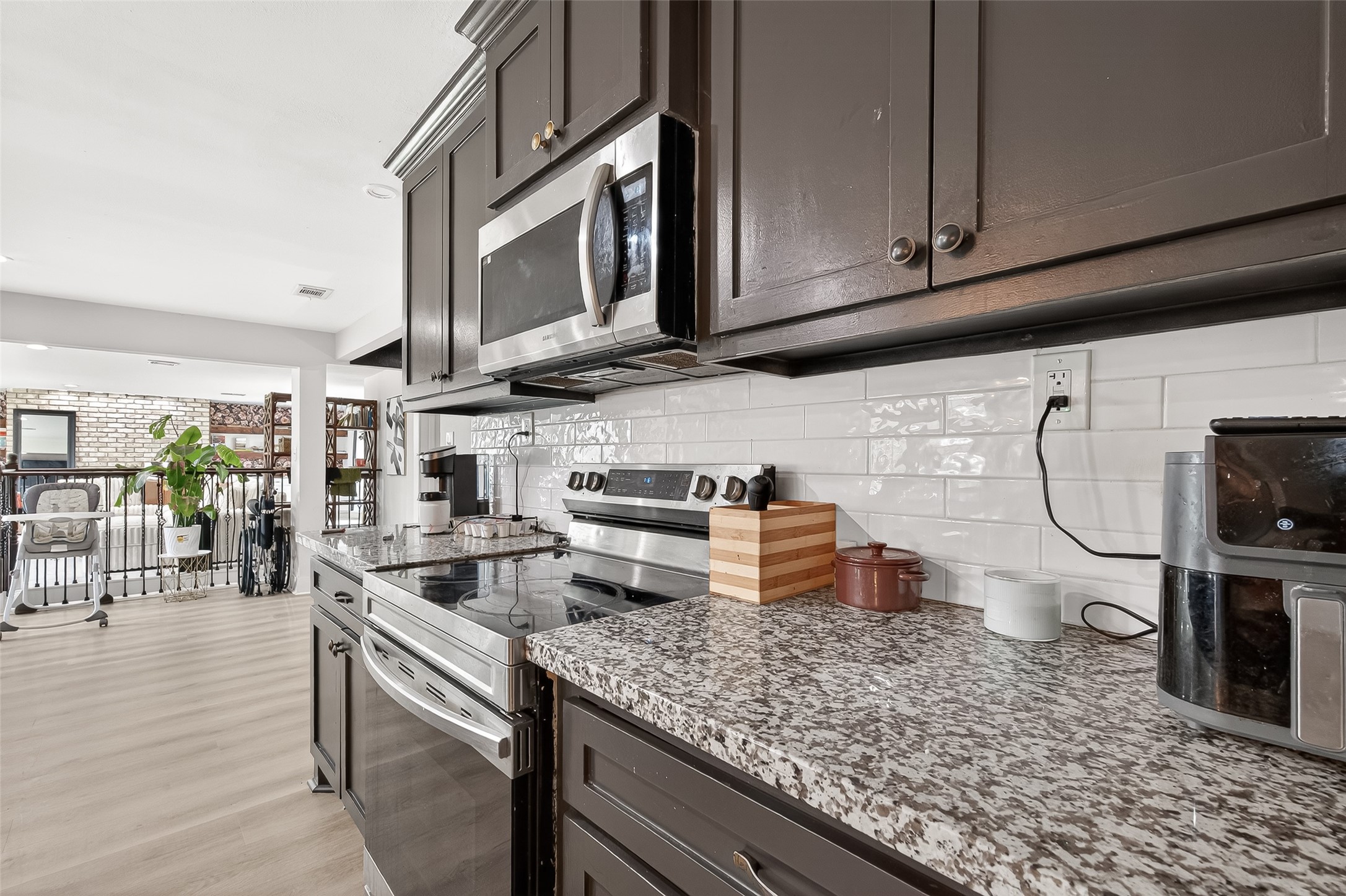 29927 County Road 25 Damon, TX 77430 - Photo 13 of 43 a kitchen with stainless steel appliances granite countertop a sink a stove and cabinets