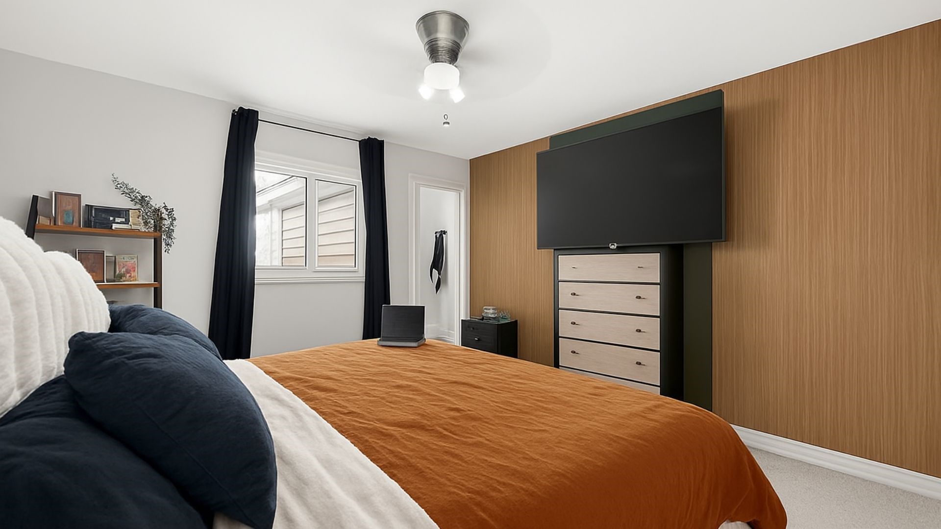 29927 County Road 25 Damon, TX 77430 - Photo 15 of 43 a bedroom with a bed and a flat tv screen on dresser