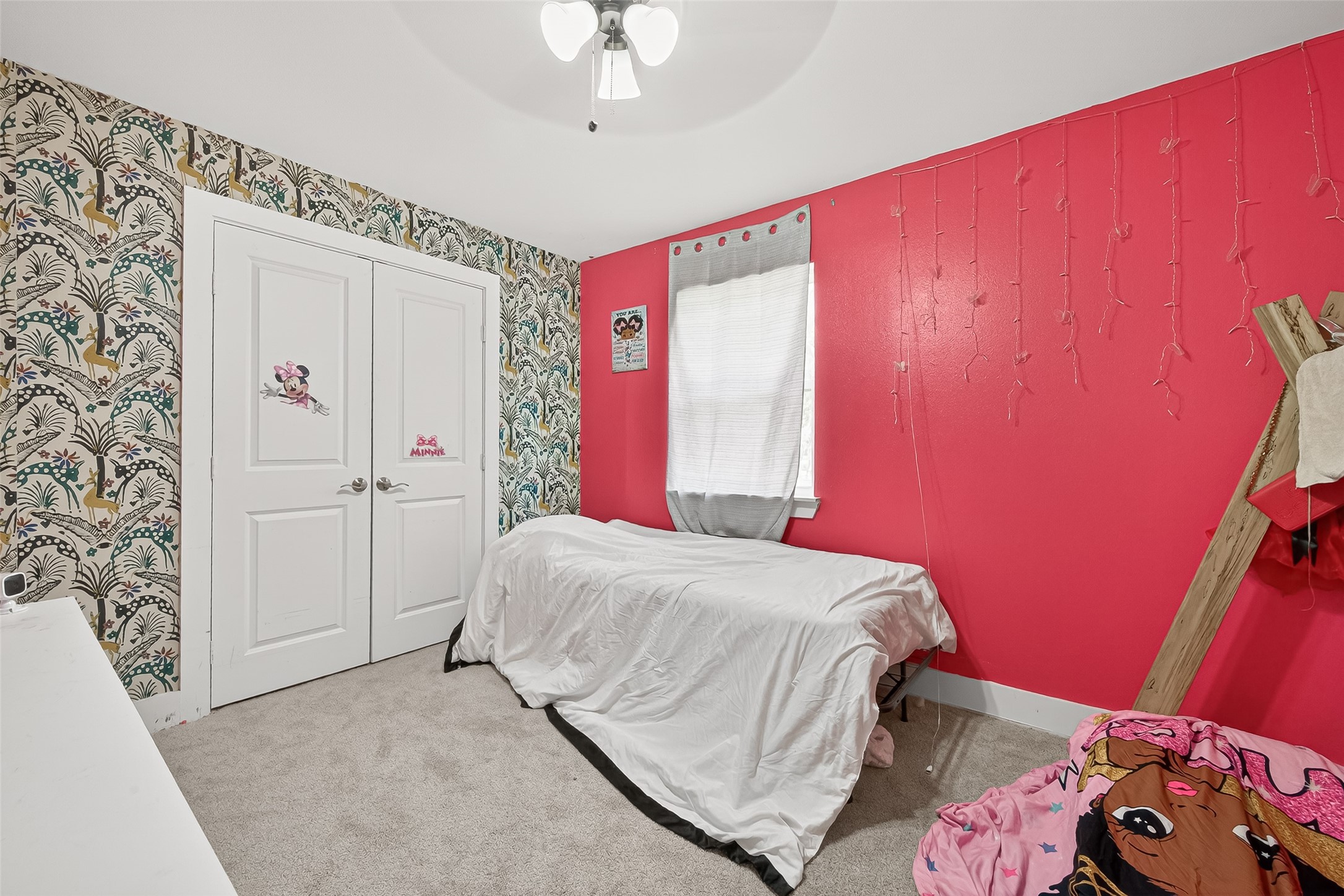 29927 County Road 25 Damon, TX 77430 - Photo 18 of 43 a bedroom with a bed and a mirror