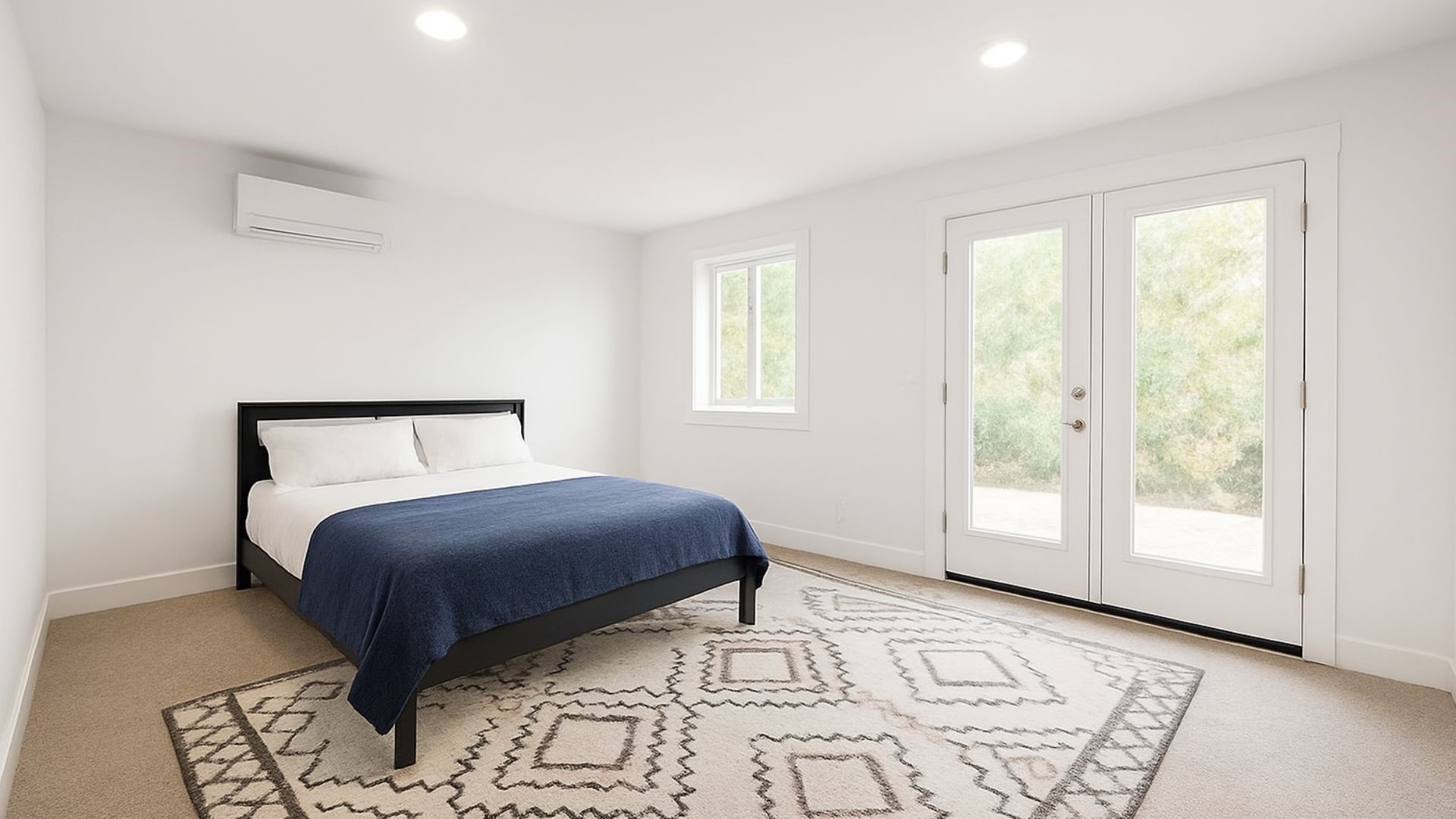 29927 County Road 25 Damon, TX 77430 - Photo 24 of 43 a bedroom with a large bed and a window