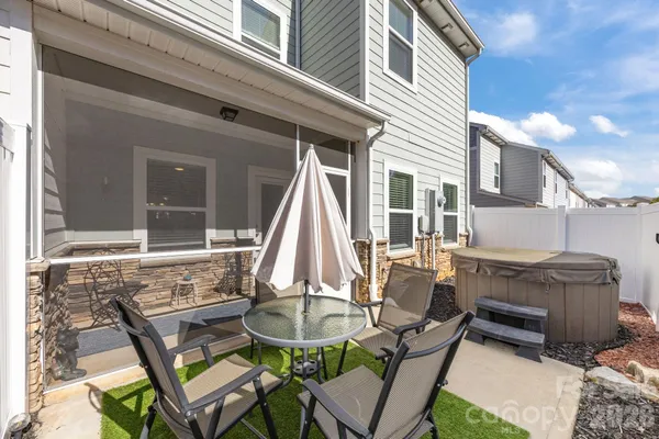 a view of house with outdoor seating space
