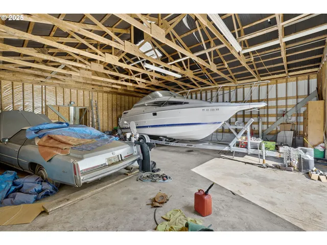 a bedroom with furniture and a chandelier