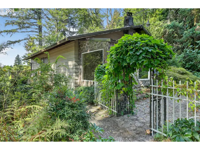a backyard of a house with lots of green space