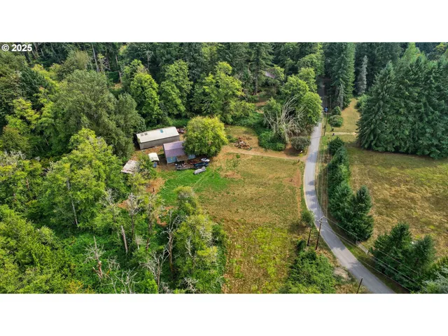 a upper view of a house with a yard