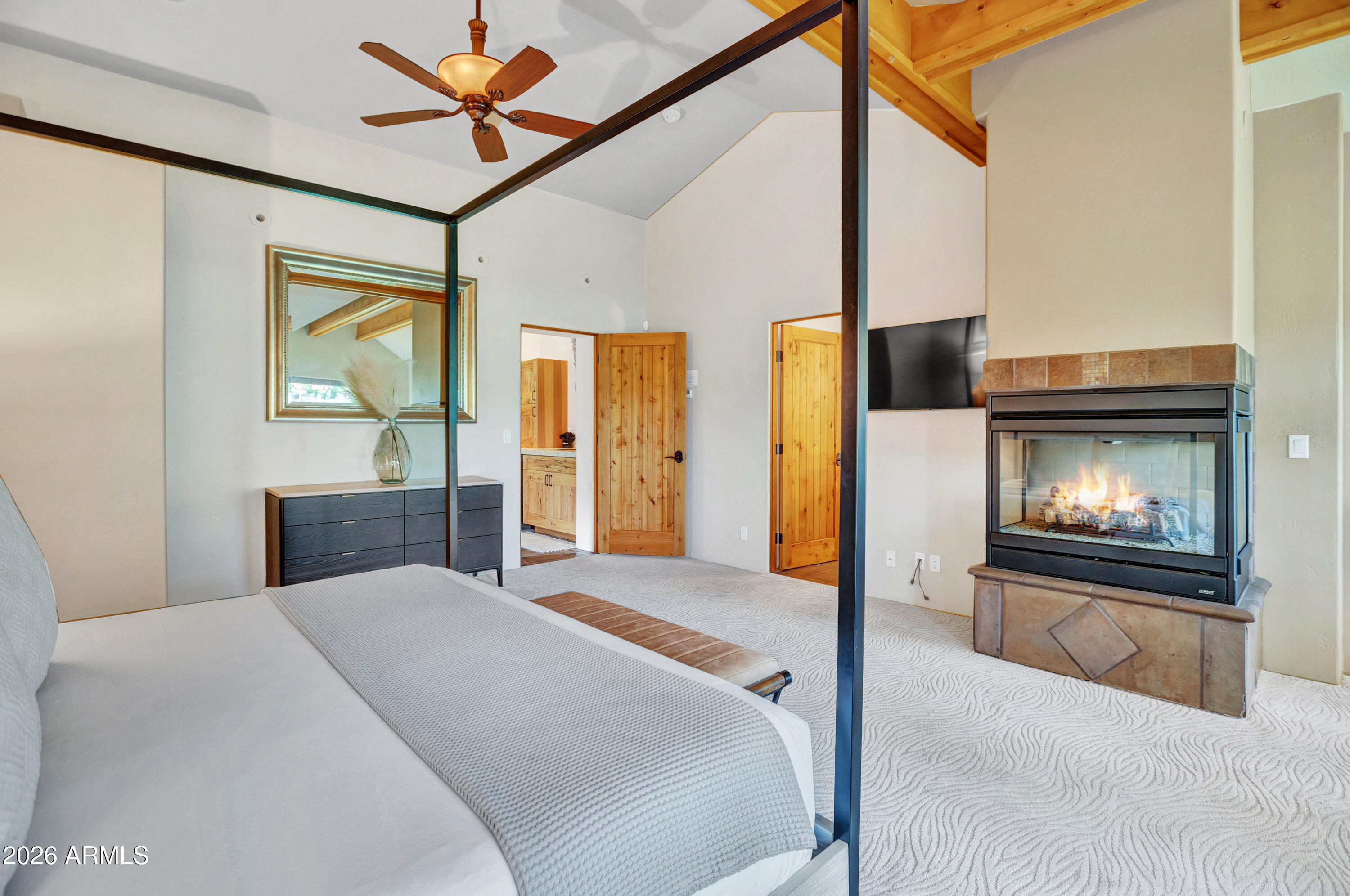 55 Ranch House Circle Sedona, AZ 86336 - Photo 31 of 61 a bedroom with a bed and a fireplace