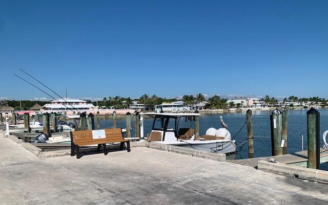 505 North Ruby Avenue Key Largo, FL 33037 - Photo 46 of 52 CLUBHOUSE VIEW FROM END OF DOCK