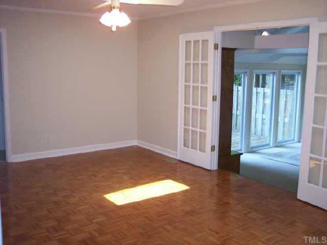 4909 Mandel Road Durham, NC 27712 - Photo 7 of 10 Family Room with view of Sunroom