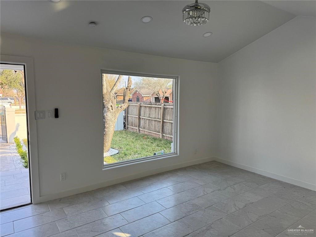 4912 South 36th Street McAllen, TX 78503 - Photo 6 of 15 an empty room with windows